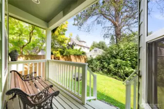 The view of your charming back yard from one of two back decks.