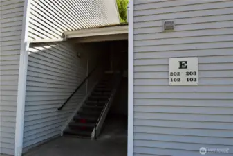 Staircase leading to unit E202