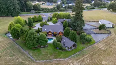 A look back at the home and property. SHOP TO THE RIGHT DOES NOT CONVEY WITH THE HOME.