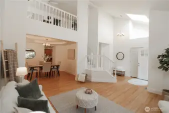 Open-concept living area with vaulted ceilings creates an airy, spacious feel