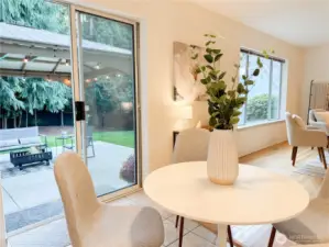 Charming breakfast nook creates the perfect spot for casual dining while enjoying views of your private backyard. Large sliding doors that connect indoor and outdoor living spaces seamlessly.