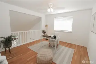 Versatile upstairs loft area perfect for a home office, study space, or easily convertible to a 4th bedroom to suit your family's needs.