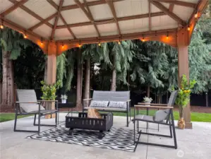 As evening falls, enjoy the magical ambiance of your illuminated gazebo, perfect for entertaining or quiet relaxation.