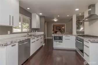 Sleek granite countertops and modern finishes.