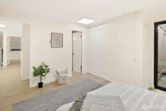 Bedroom #1 on upper level, with extra-large closet and jack-and-jill bathroom access.  Private patio for morning yoga or growing a mini-garden.