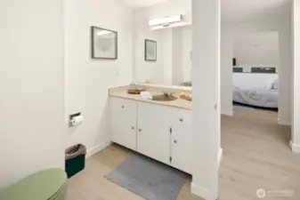 Full bathroom upstairs with sink, toilet, shower/tub.  The 2nd bedroom has its own private sink.