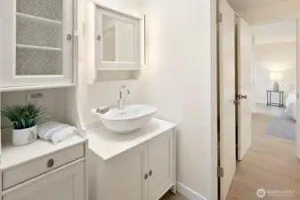 Private sink and additional storage accessed by Bedroom #2.