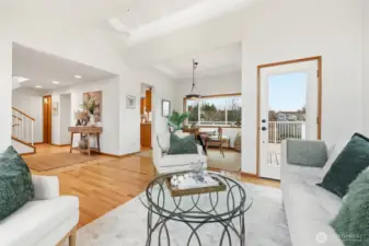 Living room and dinning room with another access to the wrap around view deck