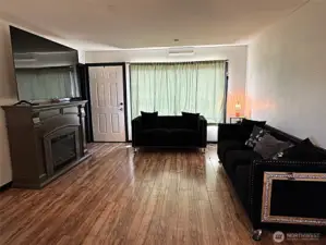 Living room with Laminate wood flooring