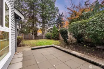 Private backyard patio perfect for outdoor dining and entertaining.
