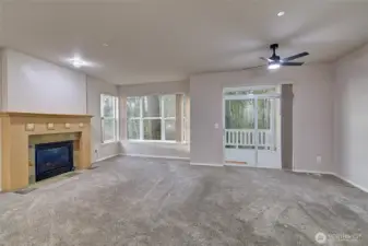 Oversized windows and patio door provide beautiful sunrises, and abundant natural light.