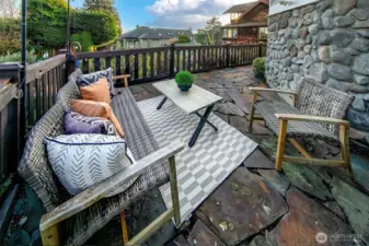 Great outdoor spaces include decks from living and primary suite, a low maintenance front yard and a ground level sunshine terrace.