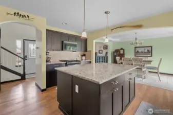 Kitchen Features Granite Countertops and Stainless Steel Appliances.