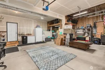 Large, Finished Garage Features a Storage Loft and is Wired For a Whole-House Generator.