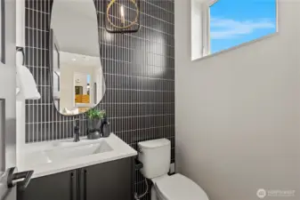 Powder room on main offers convenience