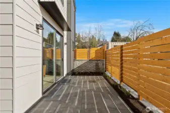 Enjoy the patio and backyard just off the main living space