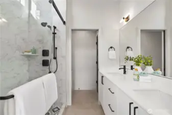 Large ensuite bathroom with high end finishes