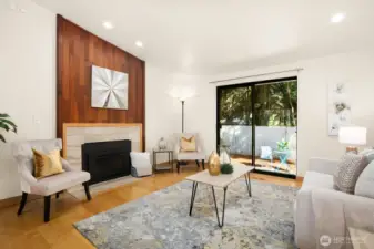 Upstairs with vaulted ceilings, gas fireplace and access to your fenced yard