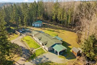 An elevated birds-eye view shows off the front of the property and all its well thought out functionality!