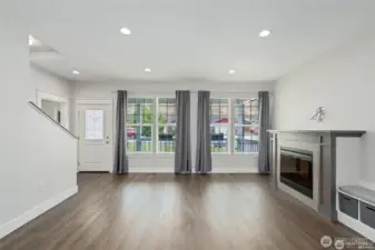 Living room with electric fireplace.