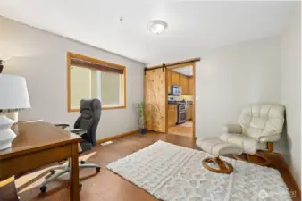 Downstairs bonus room currently staged as an office. Use as a formal dinning room, game room, etc.? No limitations as there is heat & there are doors on each ends of the room & a window.
