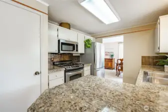 Kitchen with pantry and SS appliances