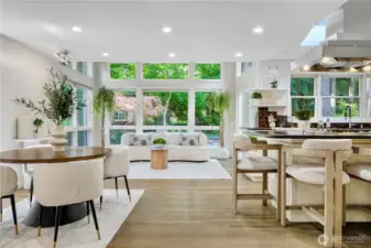 Modern and elegant interior featuring a living area, dining space, and kitchen