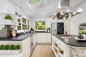 Kitchen has abundant natural light, Showcasing contemporary design and comfortable furnishings