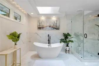 Luxurious, modern, and spacious bathroom designed with a serene and spa-like ambiance