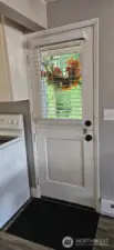 Dutch door opens to carport