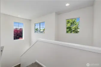 Upstairs stairwell with extra windows.