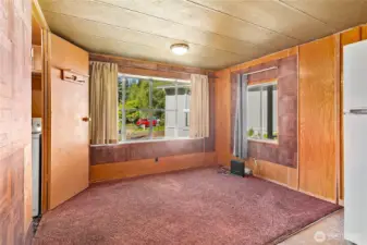 Dining area off of the kitchen. Or office space?
