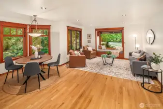 Great room with generous dining and living areas. Lots of room here for entertaining or cozying up in the window seat.