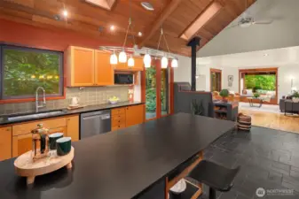 Kitchen flows nicely into dining and living rooms.