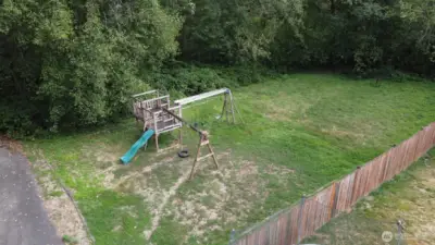 Neighborhood play structure- just beyond fully fenced backyard