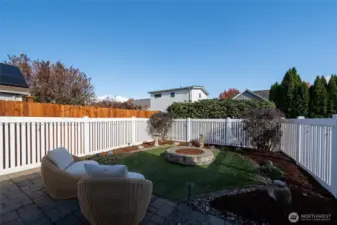 The back yard is built to enjoy the turf grass and privacy.
