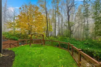 Two gates into rear yard makes mowing a breeze and keeps four-legged pets contained.