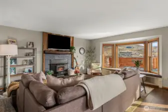 Cozy living room with woodburning fireplace