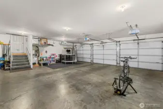 960 square foot full size garage with three vehicle doors
