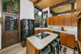 Dutch door allows access to the court yard and a great space to BBQ off the patio