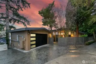 The front of the home showing off the driveway and extra parking.