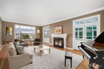 Grand-piano sized formal living room also with picture window overlooking Bay.