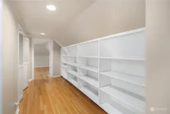 Third Floor Hallway with built-in shelves for games, books and toys.