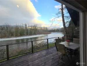 Looking upriver from your living room to your entertaining deck.