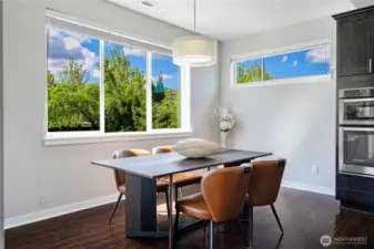 Dining area next to kitchen and Living, opens to Backyard w slider door