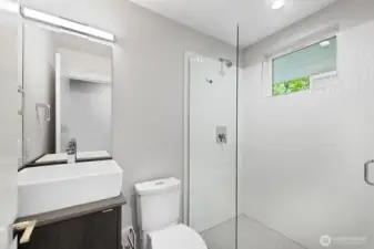 Secondary bathroom off bedroom on entry level.