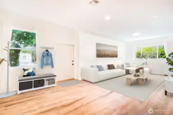 Step into this open floor concept living area with large, light-filled windows.