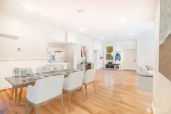 Ideal for hosting, the kitchen looks into the dining and living areas.