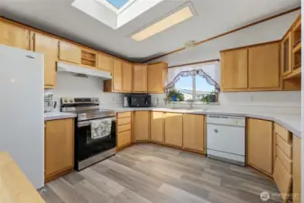 Large kitchen, with cabinets galore and new flooring