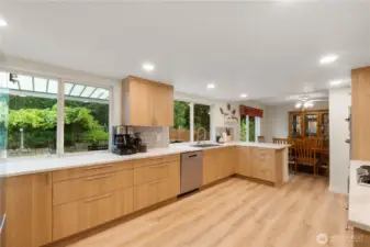 This spacious kitchen is a showstopper! Featuring custom light-color cabinets that add both elegance & warmth.  With its generous layout & high-end finishes this kitchen is as functional as it is beautiful-perfect for everyday meals and entertaining alike.